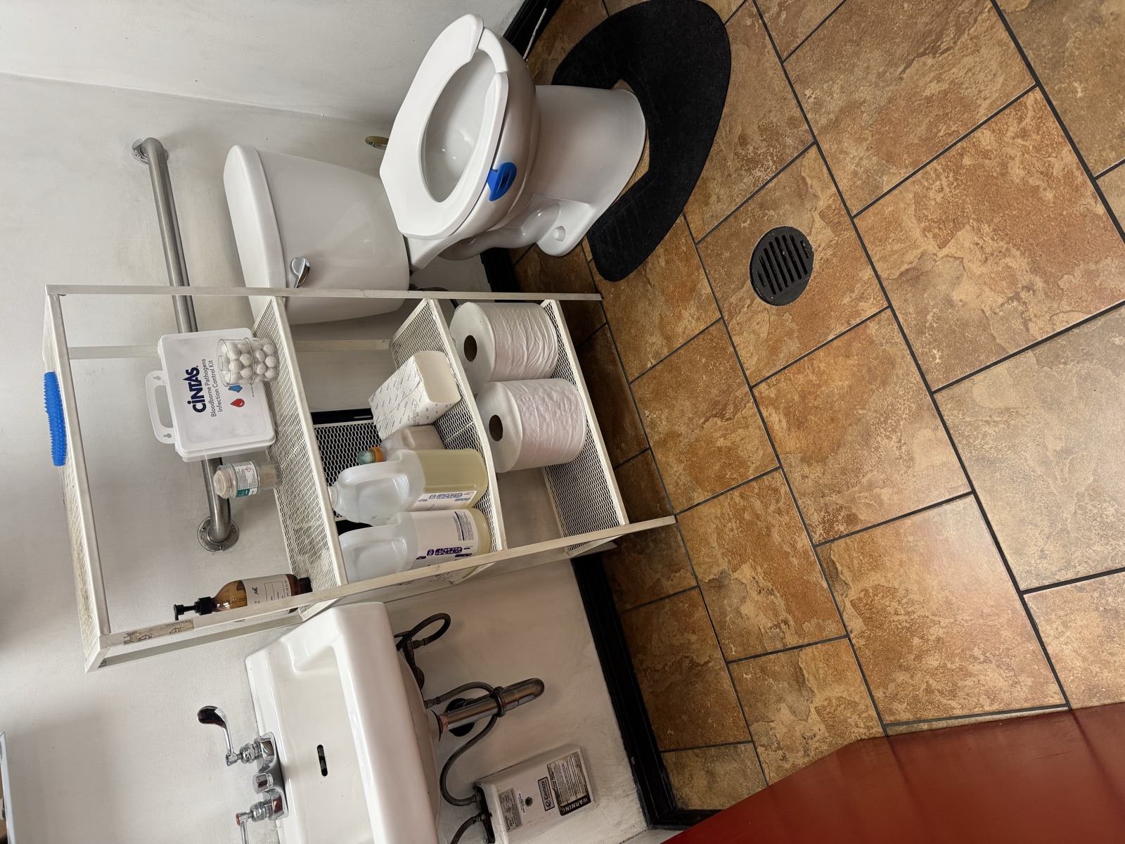 Sanitized commercial restroom with clean sinks and fixtures